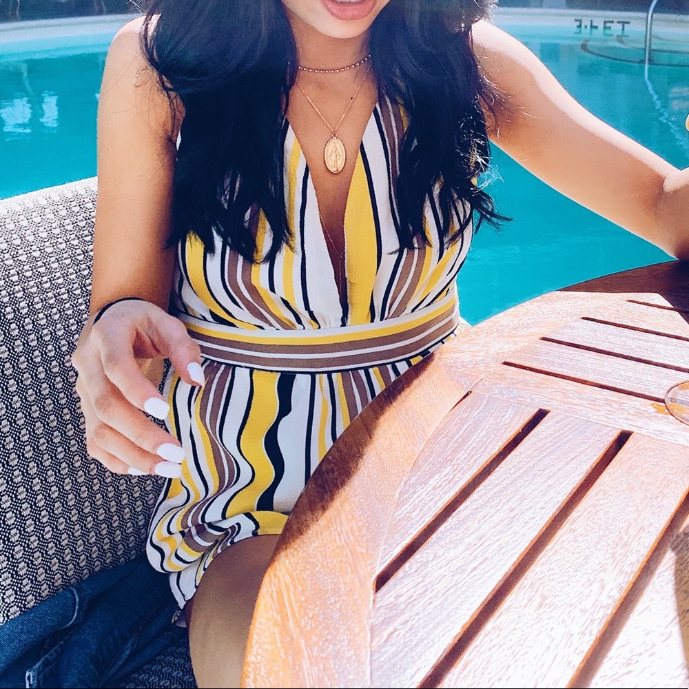 Yellow cross back romper